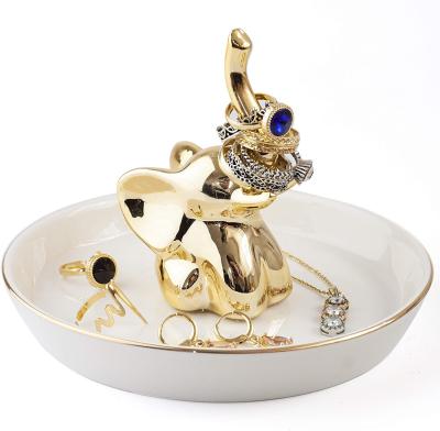 China Beautiful Smooth Gold Elephant Ceramic Jewelry Stand for sale