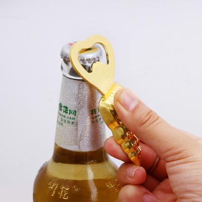 China Europe Gold Conch Seashell Bottle Opener Ocean Themed Wedding Favors Party Gold Gift for sale