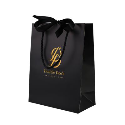 China Hot Sales Black Logo Gift Packaging Materials Custom Color Recycled Small Shopping Paper Bags For Underwear for sale