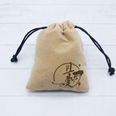 China Recyclable Orange Velvet Drawstring Bags For Packaging Luxury Customized Logo Velvet Soft Pouch for sale