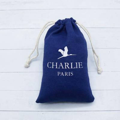 China Jewelry Packaging Cotton Drawstring Jewelry Pouch Blue Logo Printed Custom Gift Packaging Soft Cotton Pouch for sale