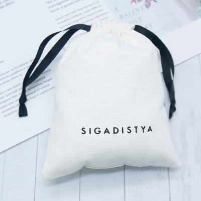 China Custom Recyclable Logo Printed Canvas Drawstring Pouch For Packaging Luxury White Canvas Gift Dust Bag for sale