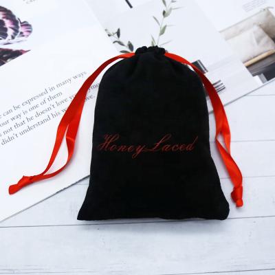 China Jewelry packing black suede jewelry pouch with logo suede luxury pouch for bracele drawstring bag with red ribbon for sale