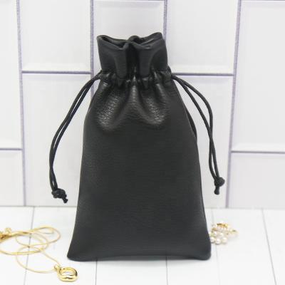 China Custom Logo Envelope Gift Small Faux Leather Bag Pu Leather Necklace Jewelry Packaging Packaging With Drawstring Pocket for sale