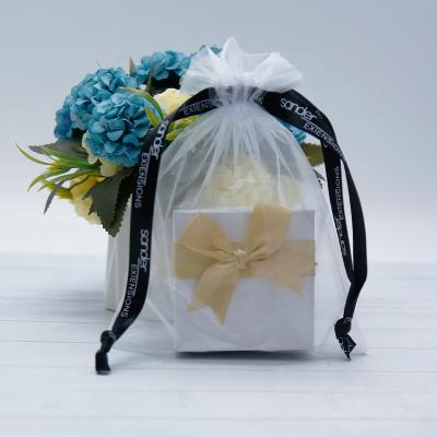 China Luxury Wrap Drawstring Jewelry Pouch Christmas Gift Birthday Gift Bag Organza Packaging Pouch for sale