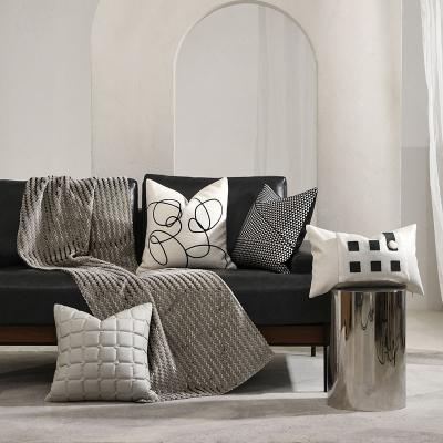 China Anti-static modern minimalist luxury sofa triangle sofa graphic custom tile black and white quilting decorative pillow for sale