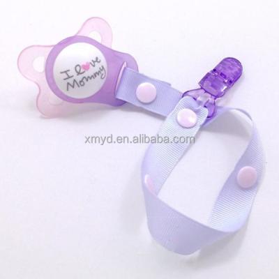 China High quality polyester pacifier clip with ribbon string and 100% food grade silicon rings for sale