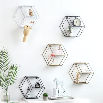 China Widely Applied Multifunctional Simplicity Metal Custom Hexagon Shelves Office Living Room Wall Shelf for sale