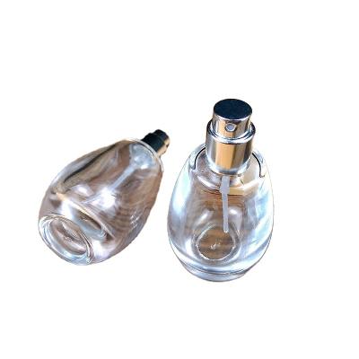 China Gift Wholesale 30ml 50ml 100ml Luxury Clear Round Spray Perfume Bottle for sale