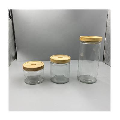 China Newly Developed Products Empty Glass Food Storage Jar Glass With Wooden Lid And Silicone Ring for sale