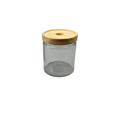 China Newly developed products cheap wooden covers, transparent glass jars and glass jars for honey for sale