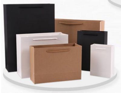 China Black box horizontal white card gift paper bag for men and women. for sale