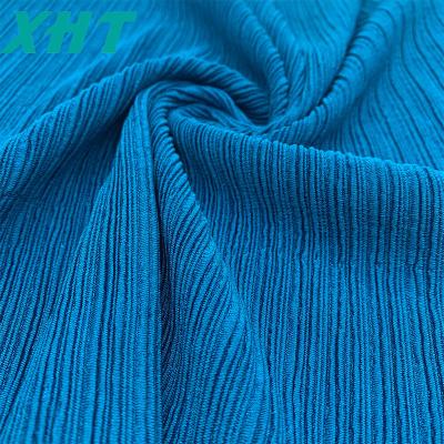 China Sustainable Custom Made Polyester Spandex Cotton Seersucker Fabric For Swimwear Bikini And Yoga for sale