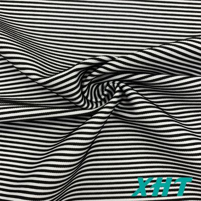 China Customized viable hot sale striped fabric yarndyed color polyester spandex rib fabric for swimwear for sale