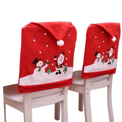 China Indoor Santa Claus Red Hat Christmas Chair Cover Table Decoration Christmas Dining Table Decoration Christmas Banquet Kitchen Decor for sale