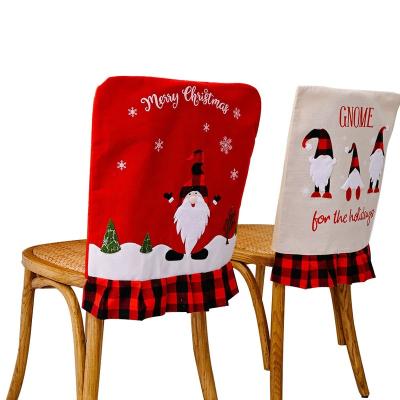 China Indoor Christmas Decoration Christmas Dining Chair Covers Christmas Feast Removable Covers Santa Claus Christmas Chair Covers for sale