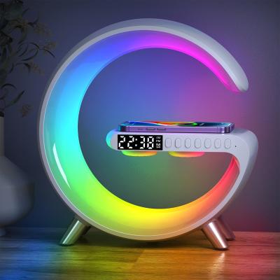 China Popular 2023 Modern Smart LED Atmosphere Lamp With Phone Charger Alarm Clock Desk Lamp Bluetooth Speaker RGB Wireless Night Lamp for sale