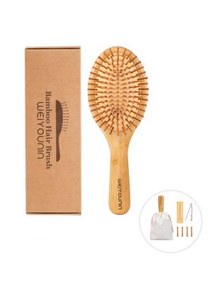 China Eco friendly wooden cushion Biofriendly detangle logo palette extension wooden vegan customized bamboo hair brush for sale