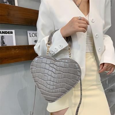 China PU Fashion Women Grab Purses Girls Small Cross - Body Purse Women Handbags Heart Shaped Cross - Body Bags Young Women Cross - Body Purses for sale