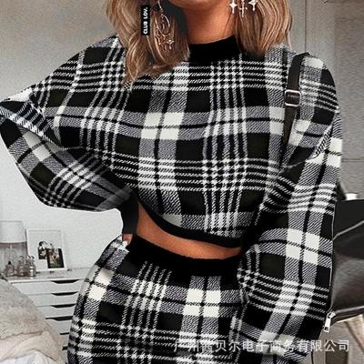 China Winter fashionable short skirt suit news grid tapered body plaid sweater breathable sexy wrap buttocks for sale