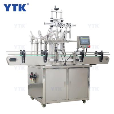 China Chemical Automatic 50-500ML Four Heads Oil Juice Bottle Sachet Liquid Filling Machine for sale