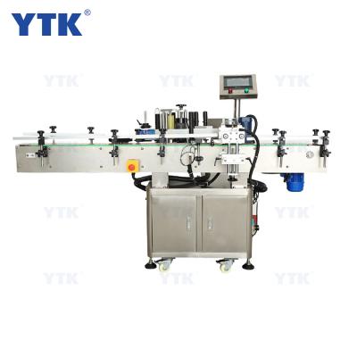 China YTK-260 Automatic Vertical Round Food Bottle Positioning Labeling Machine For Pet Bottles for sale