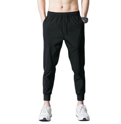 China 2021 outdoor sports tracksuit anti-pilling track runner low price custom pants plus size men pants and trousers for sale