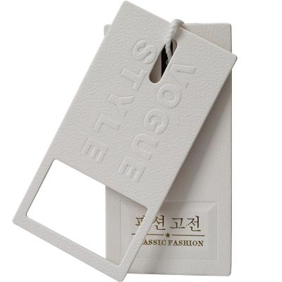 중국 High Texture Grade Apparel Hot Gold Concave Convex Embossed Label Sling Customized 판매용