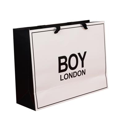 Chine Recycled Materials Cheap Wholesale Price Famous Brand Luxury Gift Custom Printed Shopping Paper Bag With Your Own Logo à vendre