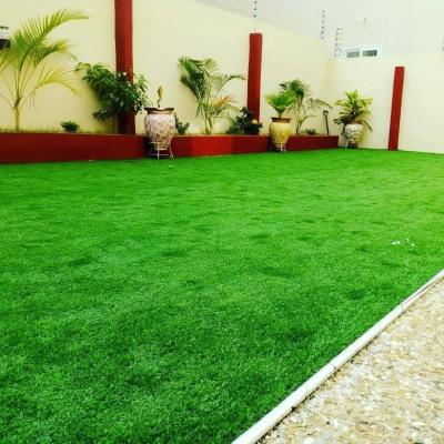 China Outdoor Badminton Stitching Cheap Synthetic Artificial Tape Grass Mat Roll For Wall for sale