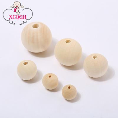 China Wood 10mm 14mm 16mm 20mm Round Loose Wooden Teether Beads DIY Teething Necklace Wood Bead For Baby Teether 100PCS for sale