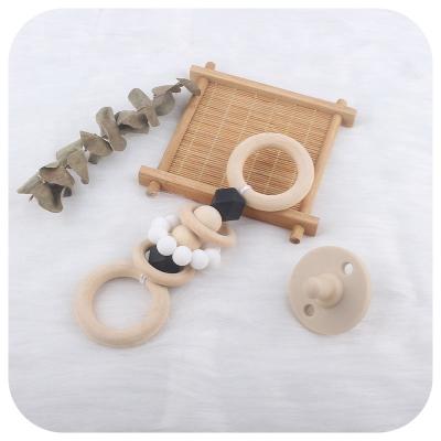 China Toy Natural Wood Beech Wooden Soft Ring Teether Rattle Toy for sale