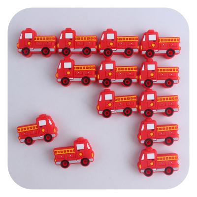 China Toy Fire Engine Baby Soft Silicone Teether With Wooden Ring Rattles Baby Shower Gift for sale