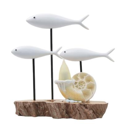 China Europe Resin Souvenirs With Led Flame Light Conch Shell And White Polyresin Fish School Fish Ornament for sale