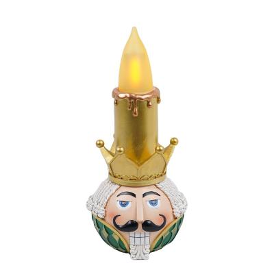 China Christamas Home Decoration Trending Products 2022 New Come With Led Candle Light Nutcracker Resin Christmas Decorations for sale