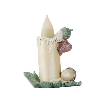 China Rustic with Pinecone Hat Christmas Gnome Riding Led Candle with Flame Light for sale