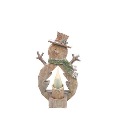 China Contemporary Modern Nordic Polyresin Abstract Art Wooden Sculpture Snowman Decor With Moving LED Candle Flame for sale