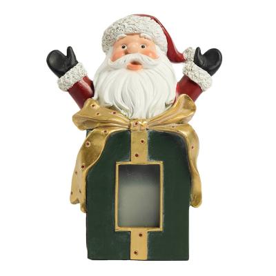 China Minimalist Personalized Polyresin Christmas Decoration Ornaments Santa Claus Figures With LED Light Supplies for sale