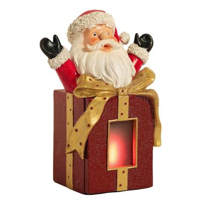 China Wholesale Polystone Christmas Santa Clause Europe Resin Statues Santa Figurine Tabletop For Decoration for sale