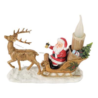 China Morden Polyresin Christmas Ornaments 2022 Luxury Golden Santa Sleigh And Reindeer With Colorful LED Lights for sale