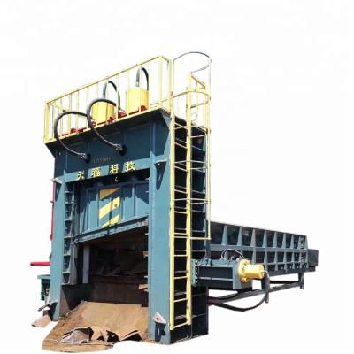 China Heavy metal pieces cut TF scrapinto 630 ton type hydraulic gantry scrap shears machine for heavy metal CE for sale