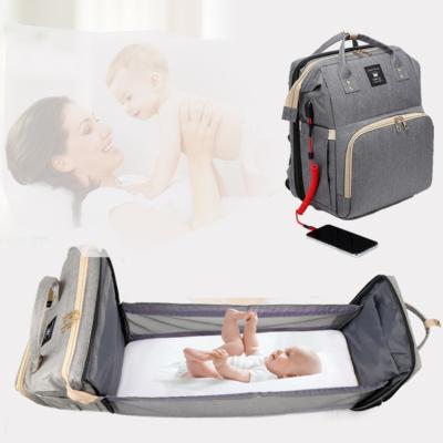 China With USB Waterproof Foldable Baby Diapers Bag Backpack Bed Mother Baby Bags Set Mum for sale