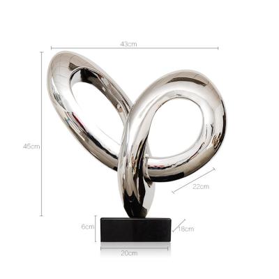 China Europe Resin Silver Sculpture Abstract Free Standing Modern Sculpture Home Decor With Rectangle Base for sale