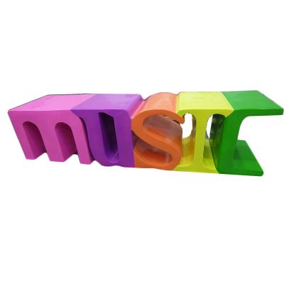 China Lightweight Outdoor Decoration Alphabet Fiberglass Benches Multicolor Bench For Shopping Mall for sale