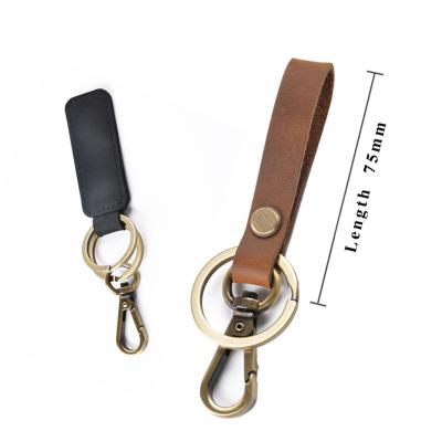 China Genuine Leather Key Indicator Luxury Custom Logo Vintage White Metal Car Key Holder Leather Strap Key Chain Holder for sale