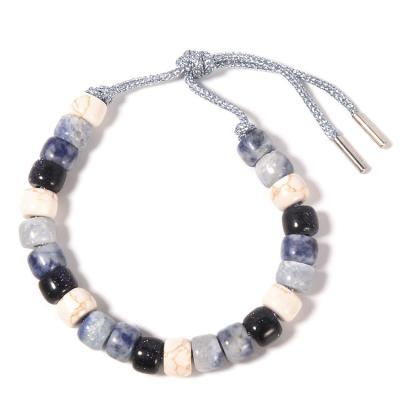 China O Sodalite Howlite perlou o bracelete 13.5g com cabo de prata trançado à venda