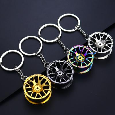 China Wholesale Custom Shape Metal Auto Hub Wheel Metal Car Key Chain For Men for sale