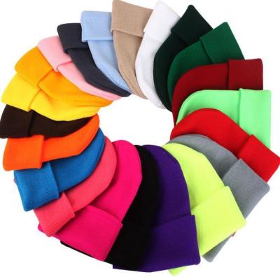 China COMMON Winter High Quality Plain Dyed Beanie Hat Custom Made 100% Acrylic Warm Knitted Beanie Custom Logo for sale