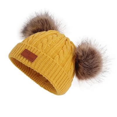 China Popular INS COMMON pom pom plush ball winter knitted vertical baby warm personalized wool hat for kids for sale