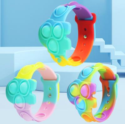 China New Hot Selling Silicone Amazon Finger Ring Bubble Puzzle Decompression Wrist Watch Band Toy for Children for sale